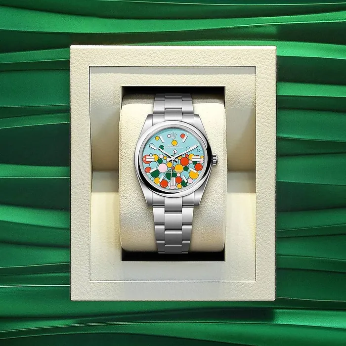 Rolex Oyster Perpetual Bubbles 41mm Ref 124300 Turquoise Blue Celebration Motif Dial Stainless Steel Oyster Bracelet Mens Watch Rolex Bracelets