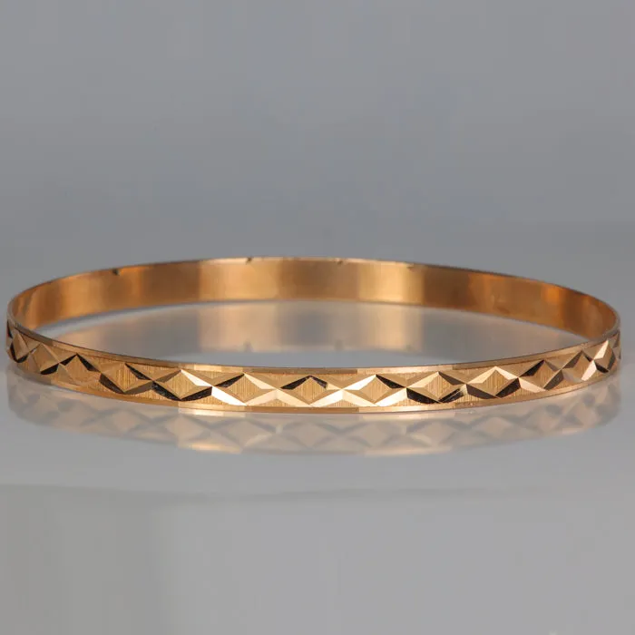 14K Yellow Gold Diamond Cut X Bangle Bracelet Moriartys Gem Art Bracelets