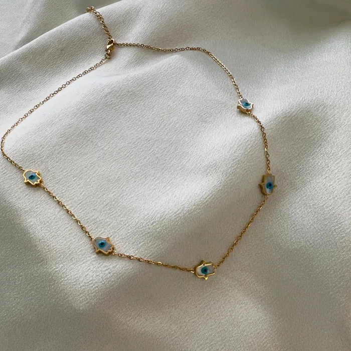 Tiny Evil Eye Hamsa Necklace Upakarna Necklaces Tiny Evil Eye Hamsa Necklace Upakarna Necklaces